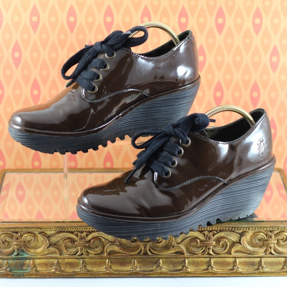 Fly London Chocolate Brown Patent Leather Wedges